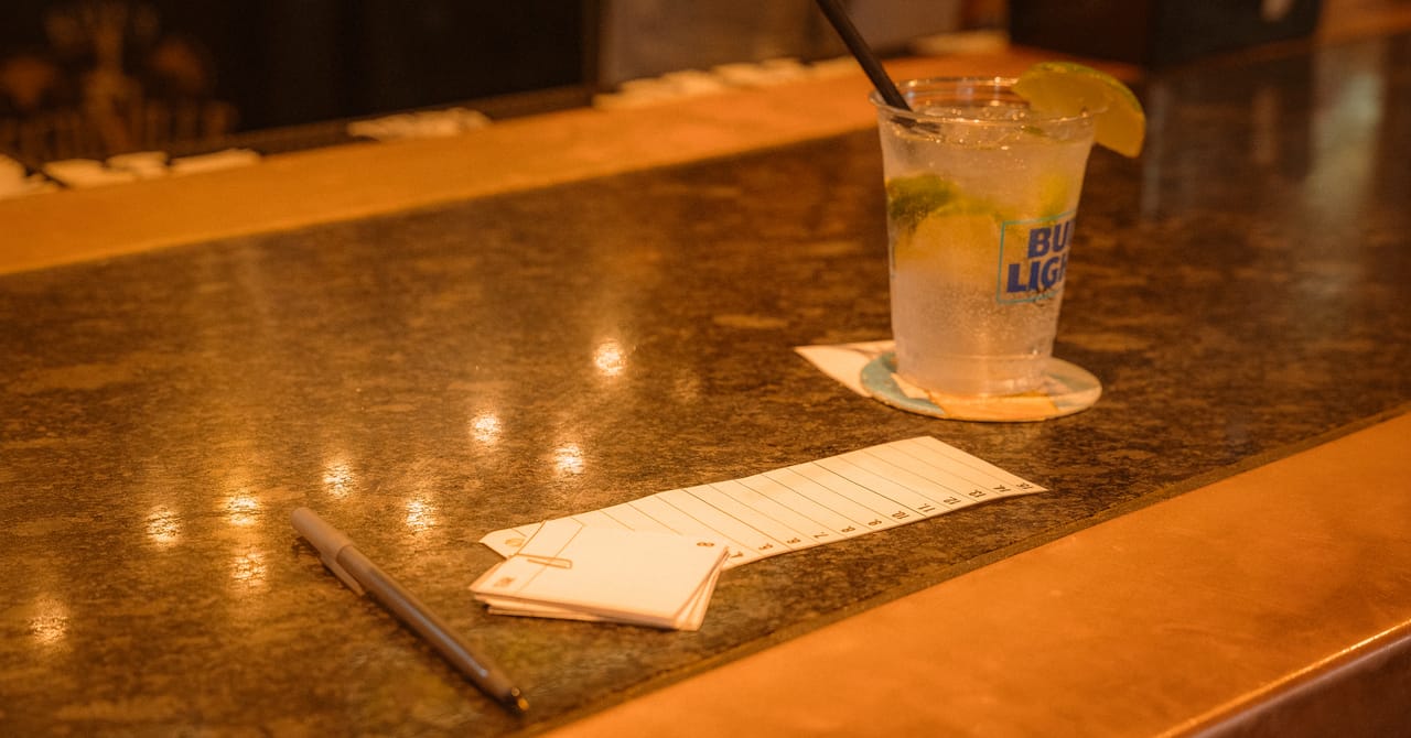 Trivia pack and pens on the table at Kite's.